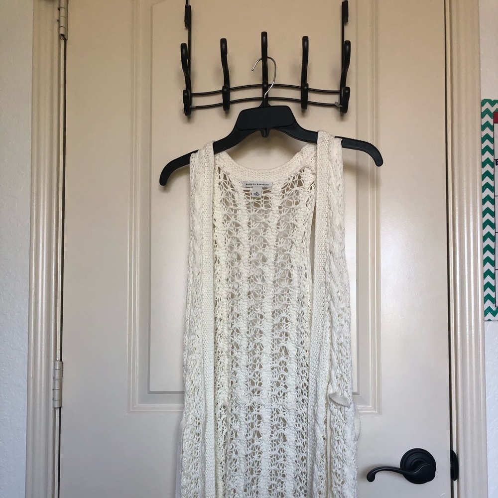 white sleeveless cardigan